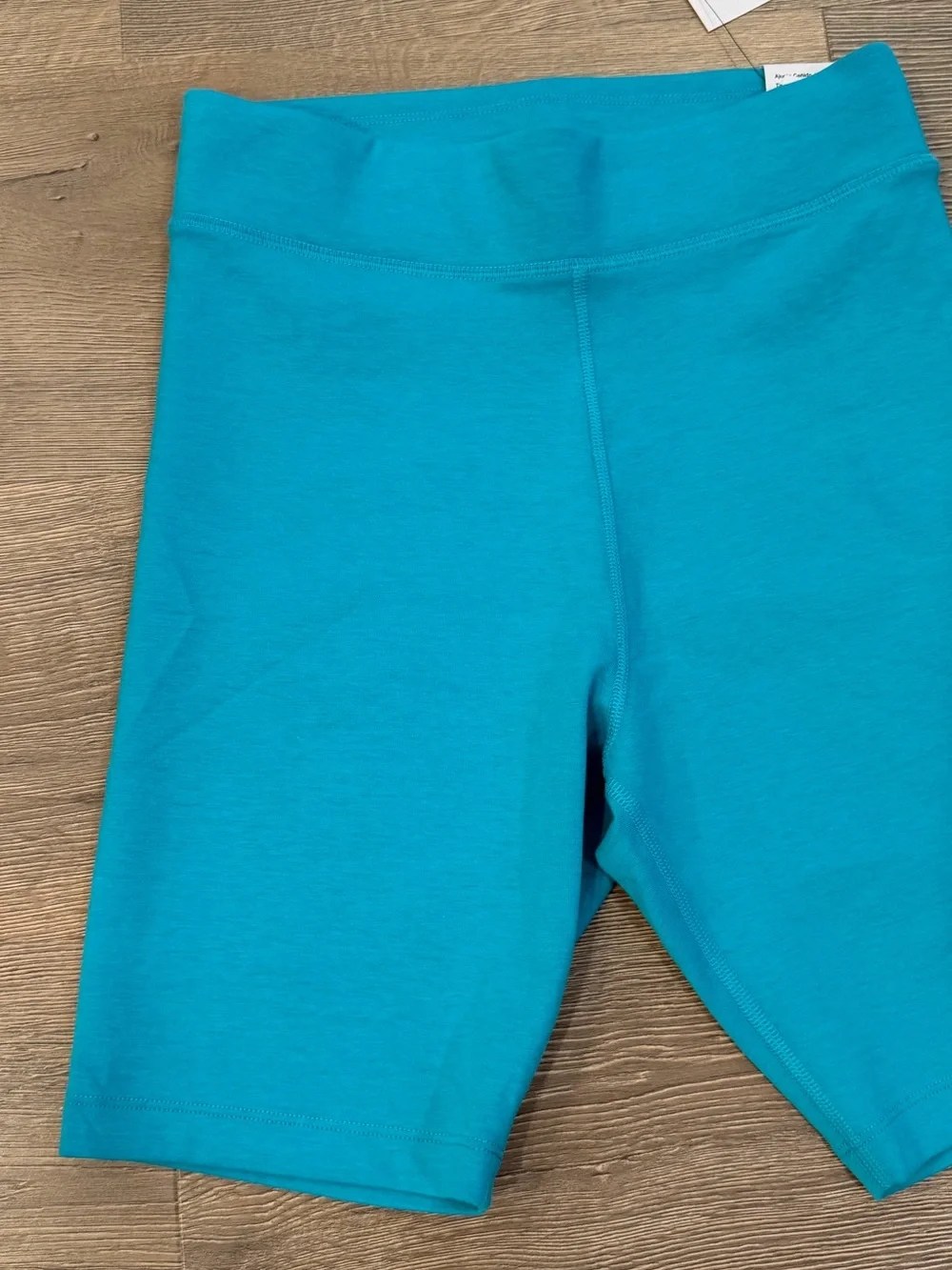 Nike Tight Fit High Rise 8” Length Biker Shorts Dusty Cactus Blue Women
